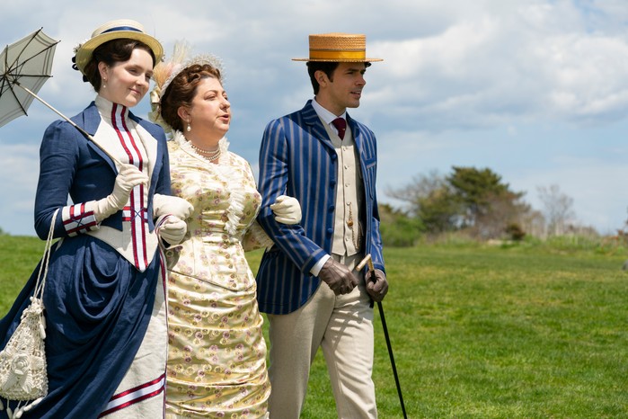 Amy Forsyth as Caroline “Carrie” Astor & Ashlie Atkinson as Mamie Fish & Harry Richardson as Larry Russell. (Image by Alison Cohen Rosa © 2021 Heyday Productions, LLC and Universal Television LLC)