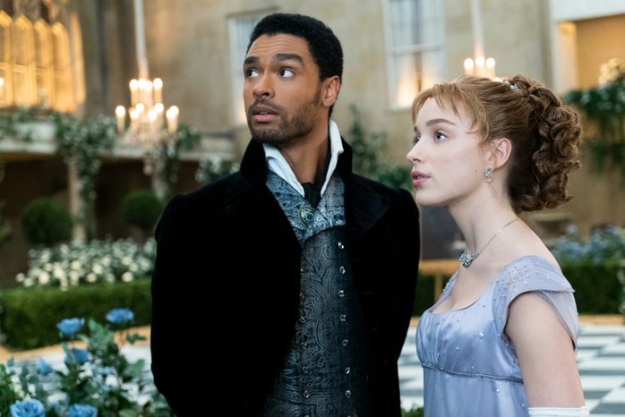 Rege-Jean Page as Simon Basset and Phoebe Dynevor as Daphne Bridgerton