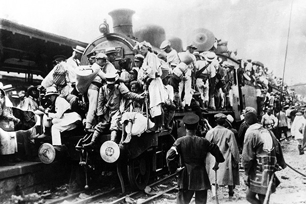 People fleeing Tokyo by train