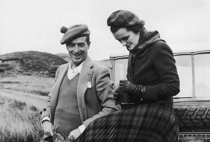 Ian Campbell, 11thh Duke of Argyll and Margaret Campbell, Duchess Of Argyll, on top of a landrover