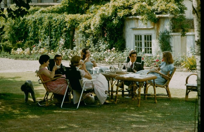 People socializing during the Season event, England, 1957 (Photo by Mark Kauffman/The LIFE Picture Collection via Getty Images)