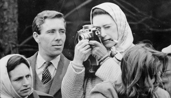 Professional photographer Antony Armstrong-Jones, the Earl of Snowdon, watches critically as his fiancee Princess Margaret (1930 - 2002) takes a snap at the Badminton Horse Trials. (Photo by Keystone/Getty Images)