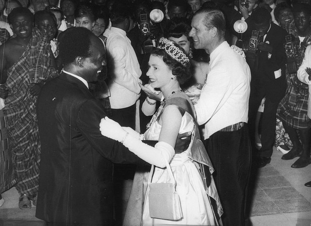 20th November 1961: Queen Elizabeth II dances with Ghanaian president Kwame Nkrumah (1909 - 1972) at a farewell ball held at State House, Accra. They, and the Duke of Edinburgh, are dancing to a version of 'High Life' composed specially for the occasion and entitled 'Welcome Your Majesty'. (Photo by Central Press/Getty Images)