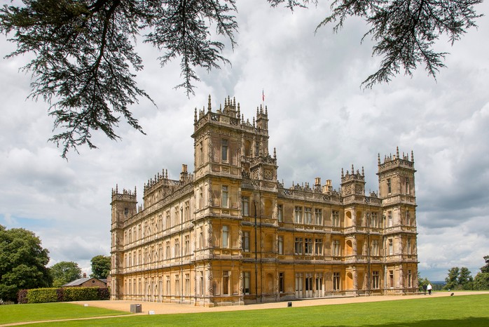 A photograph of a castle in gardens