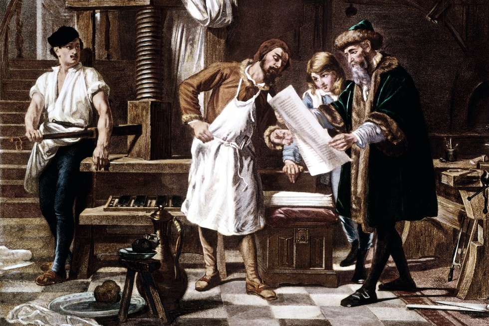 Johannes Gutenberg examines a page from the moveable type printing press that he invented