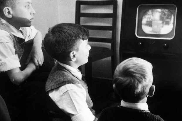 Boys watching TV in the 1950s