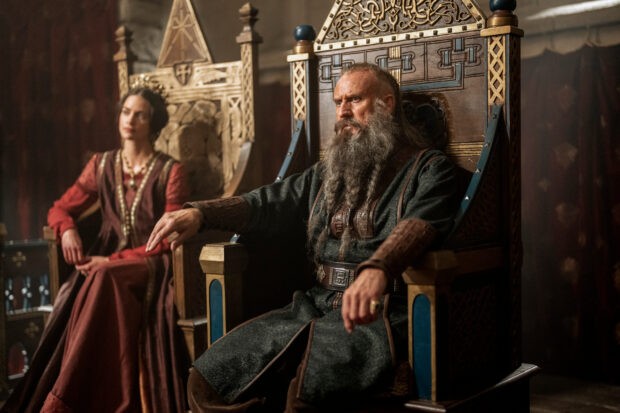Sweyn Forkbeard (Soren Pilmark) seated on a throne alongside Emma of Normandy (Laura Berlin)